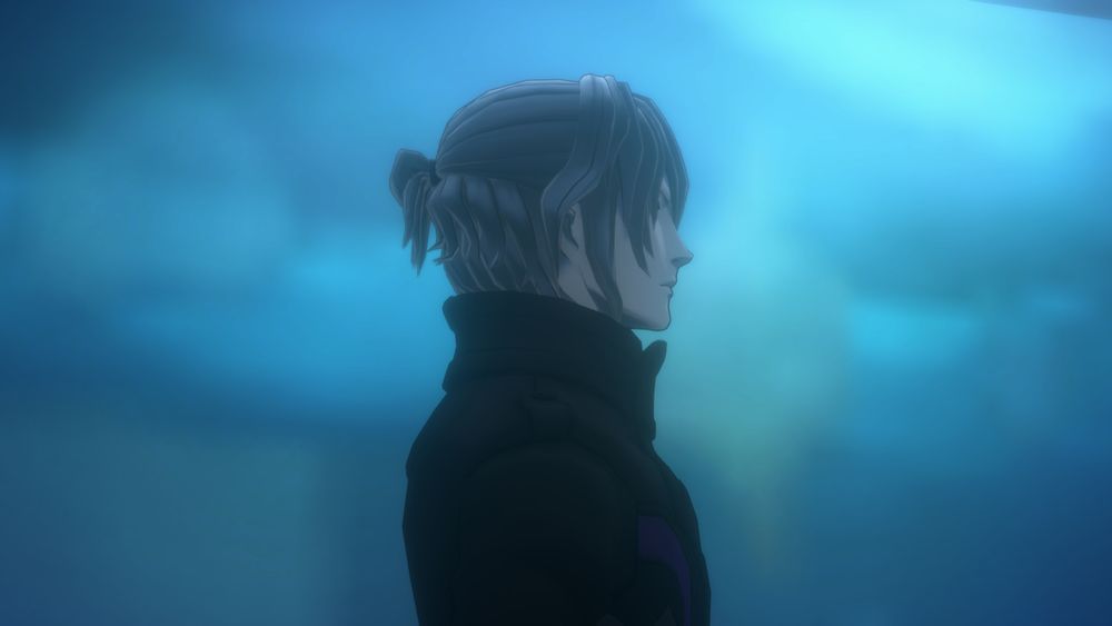 Date from a side view. He is standing against an eerie blue background