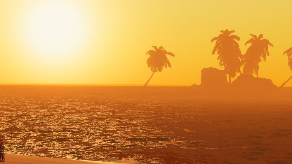 A picture of an island sunset. Palm trees visible with some rocks on an island to the right, with the sun on the left