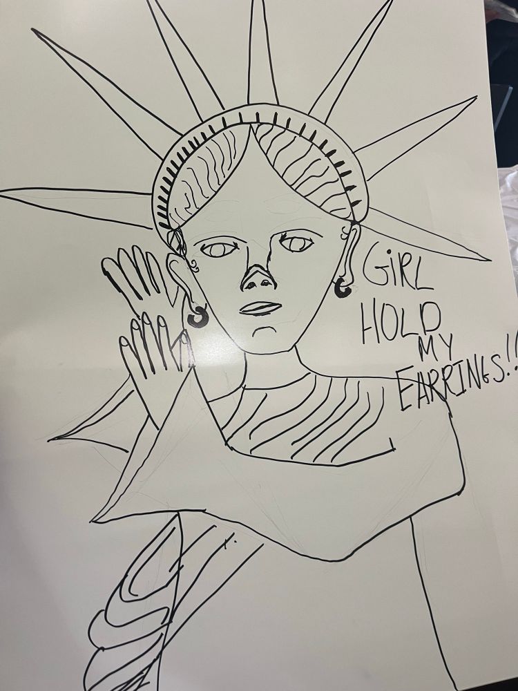 Statue of Liberty reaching to ear to take off earrings captioned with Girl, Hold my earrings 