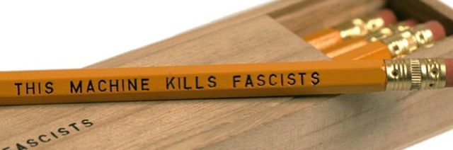Pencil emblazoned with Woody Guthrie's "This Machine Kills Fascists"