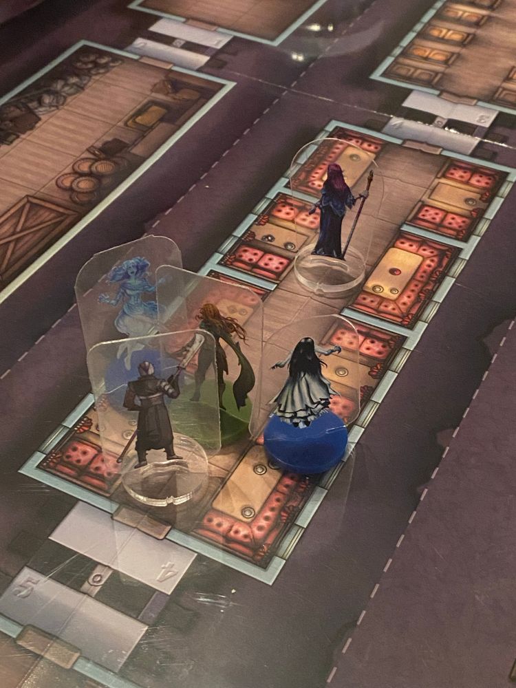 D&D Miniatures - A party of adventurers battling banshees on a train.