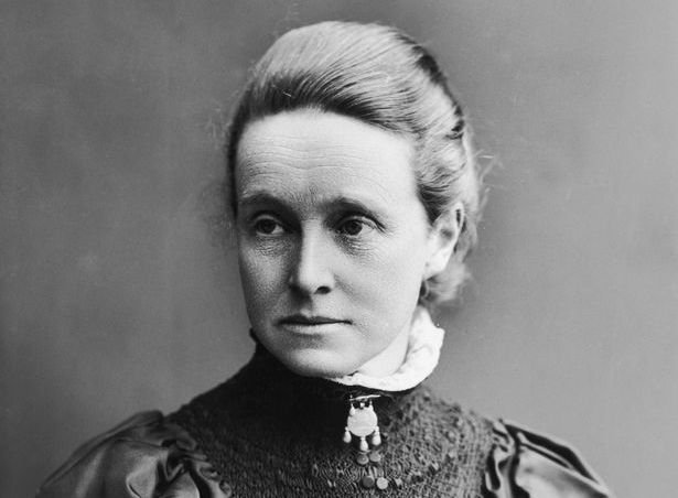 Millicent Fawcett. She is a white woman with dark hair in a bun.