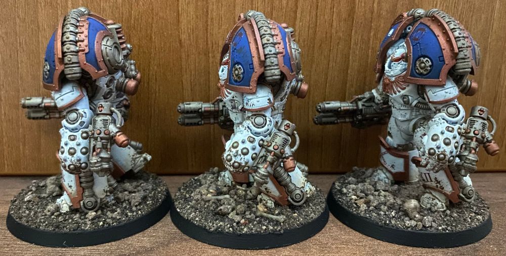 Three Saturnine Terminators painted blue and white 