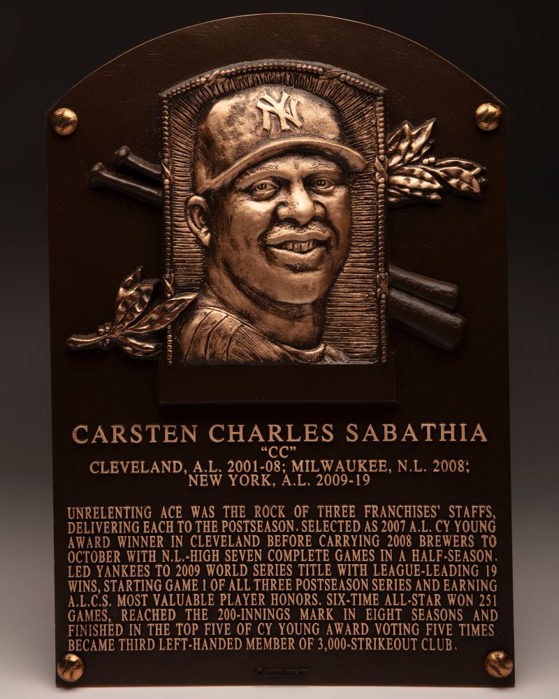 CARSTEN CHARLES SABATHIA

“CC”

Cleveland, A.L. 2001-08; Milwaukee, N.L. 2008;

New York, A.L. 2009-19

 

Unrelenting ace was the rock of three franchises’ staffs, delivering each to the postseason. Selected as 2007 A.L. Cy Young Award winner in Cleveland before carrying 2008 Brewers to October with N.L.-high seven complete games in a half-season. Led Yankees to 2009 World Series title with league-leading 19 wins, starting Game 1 of all three postseason series and earning A.L.C.S. Most Valuable Player honors. Six-time All-Star won 251 games, reached the 200-innings mark in eight straight seasons and finished in the top five of Cy Young Award voting five times. Became third left-handed member of 3,000-strikeout club.

-

Photo: Milo Stewart Jr./National Baseball Hall of Fame and Museum