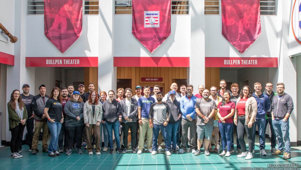 Group photo of the Sports Reference team standing in the Library Atrium. (Milo Stewart Jr./National Baseball Hall of Fame and Museum)