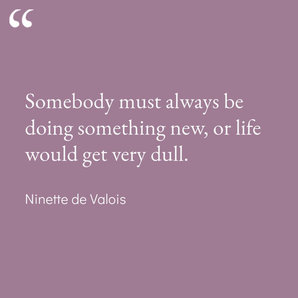 A digital graphic features a quote in white serif font on a muted purple background. The quote reads, "Somebody must always be doing something new, or life would get very dull." Below the quote, the author's name, "Ninette de Valois," is displayed in a smaller font. A large stylized quotation mark is positioned in the top left corner.