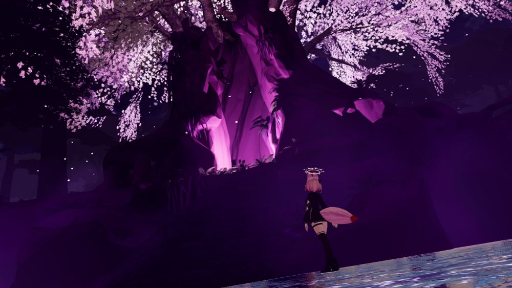 My VRChat avatar (human pink haired girl with fox ears and tail) standing in front of a massive tree that is illuminated in a pink light
