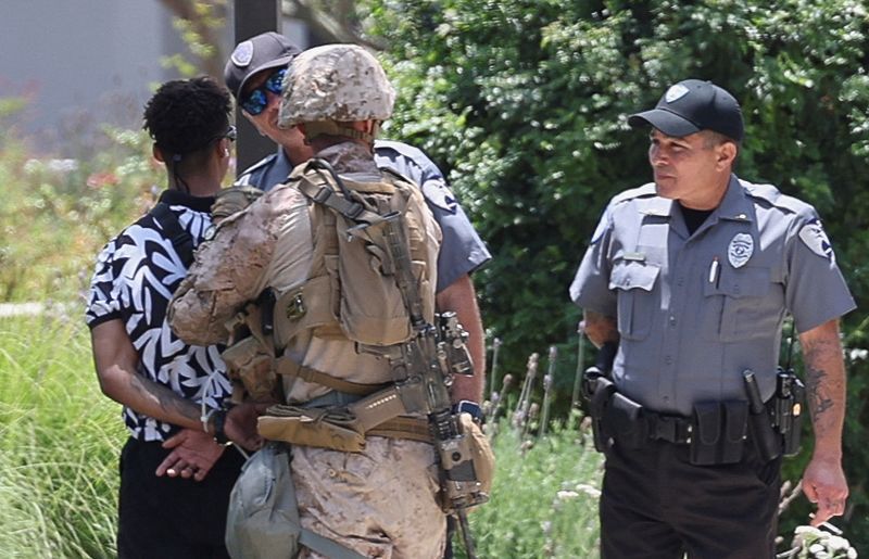 Exclusive-US Marines carry out first known detention of civilian in Los Angeles, video shows