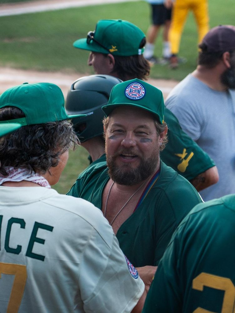Photograph of players. The back of Jimmy is visible.