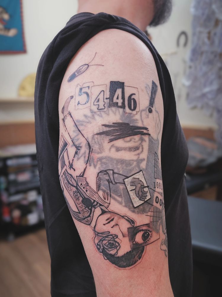 tatuagem blast over em preto por cima de uma tatuagem antiga