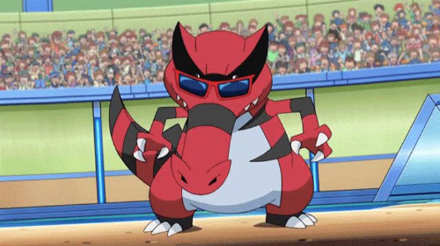 a red and black pokemon wearing sunglasses is standing in front of a crowd