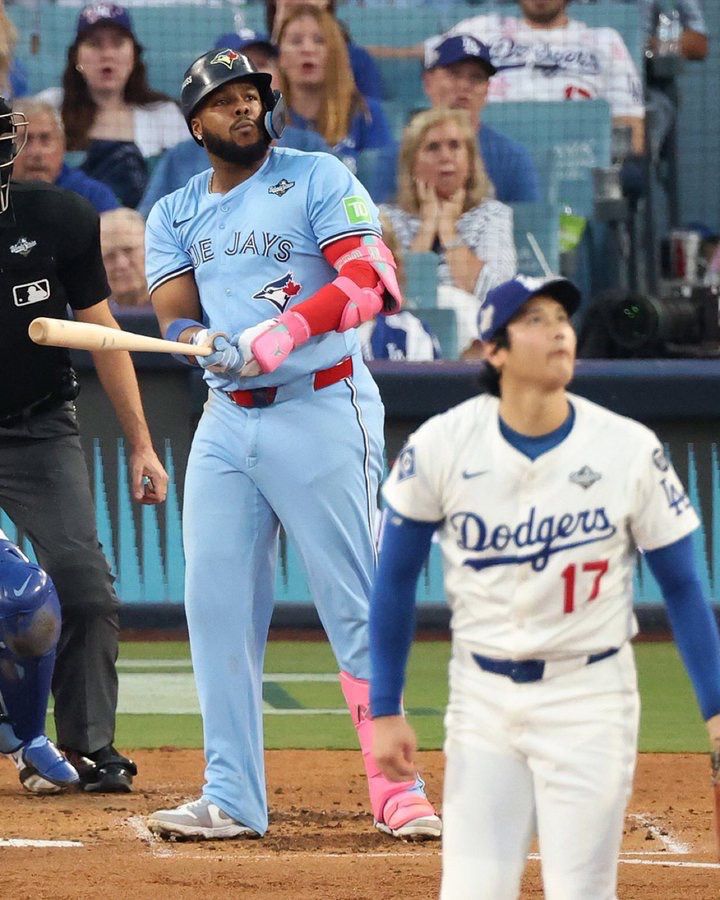 Vladdy Jr and Shohei Ohtani admiring Vlady's home run in the top of the 1st inning on Wednesday night in LA.