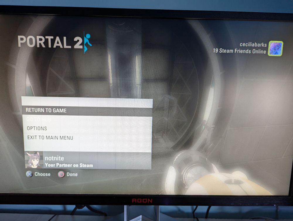 Portal 2 running on a PS3, properly connected to Steam and in a co-op game