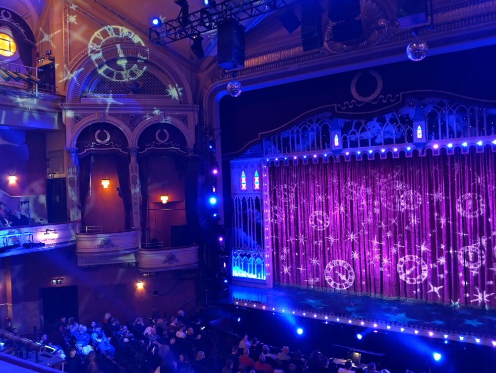 The stage of the Festival theatre Edinburgh in colourful lighting 