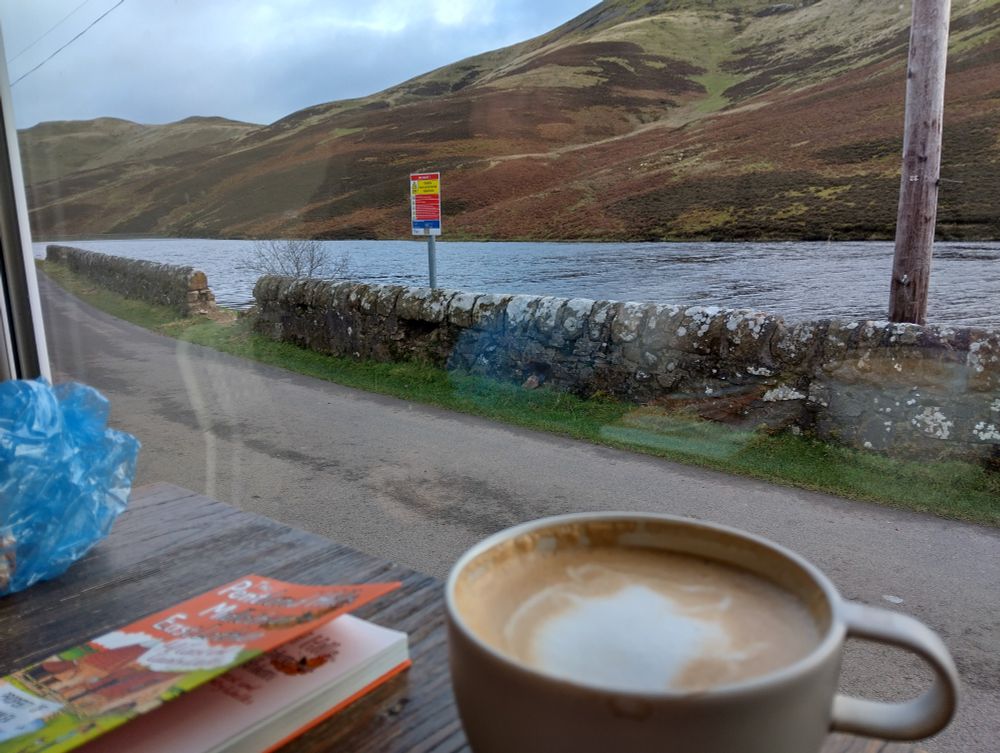 A view on the Loganlea reservoir - from inside a building, over a mug of latte. 