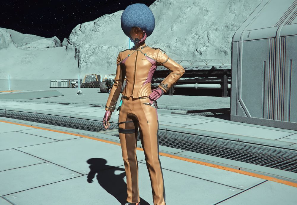 Little Blaster on the moon wearing a retro orange and pink space suit and helmet, her face is covered by the visor but her afro is sticking outside of the helmet. 