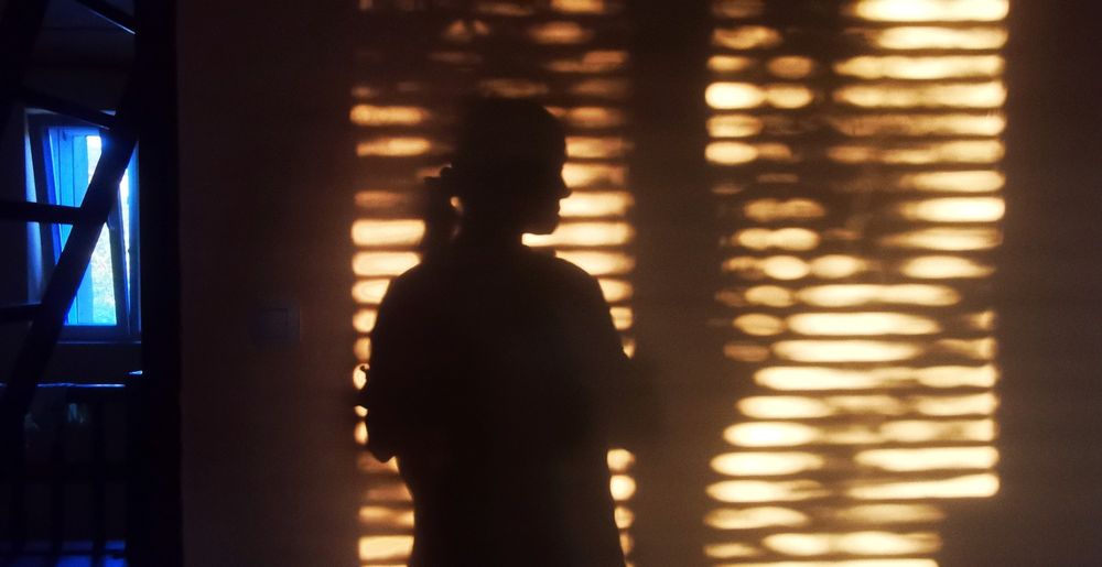 'Both shadow and light are the dance of love' said Rumi and in this picture you see a woman's shadow while she baths in a sunset. 