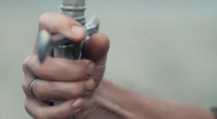 Elendil's hand holding Narsil