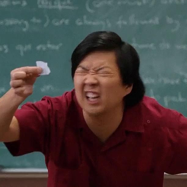 the meme of the man squinting his eyes to read off of a tiny shred of paper
