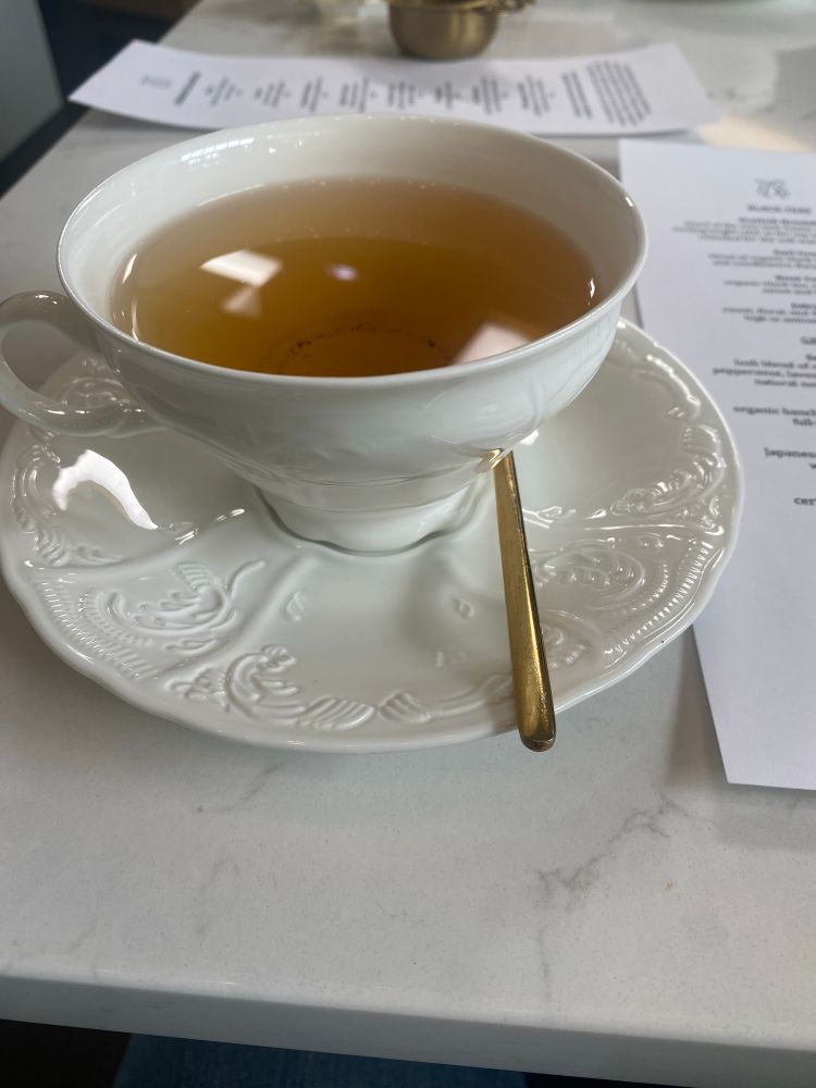 an ornate cup of green tea