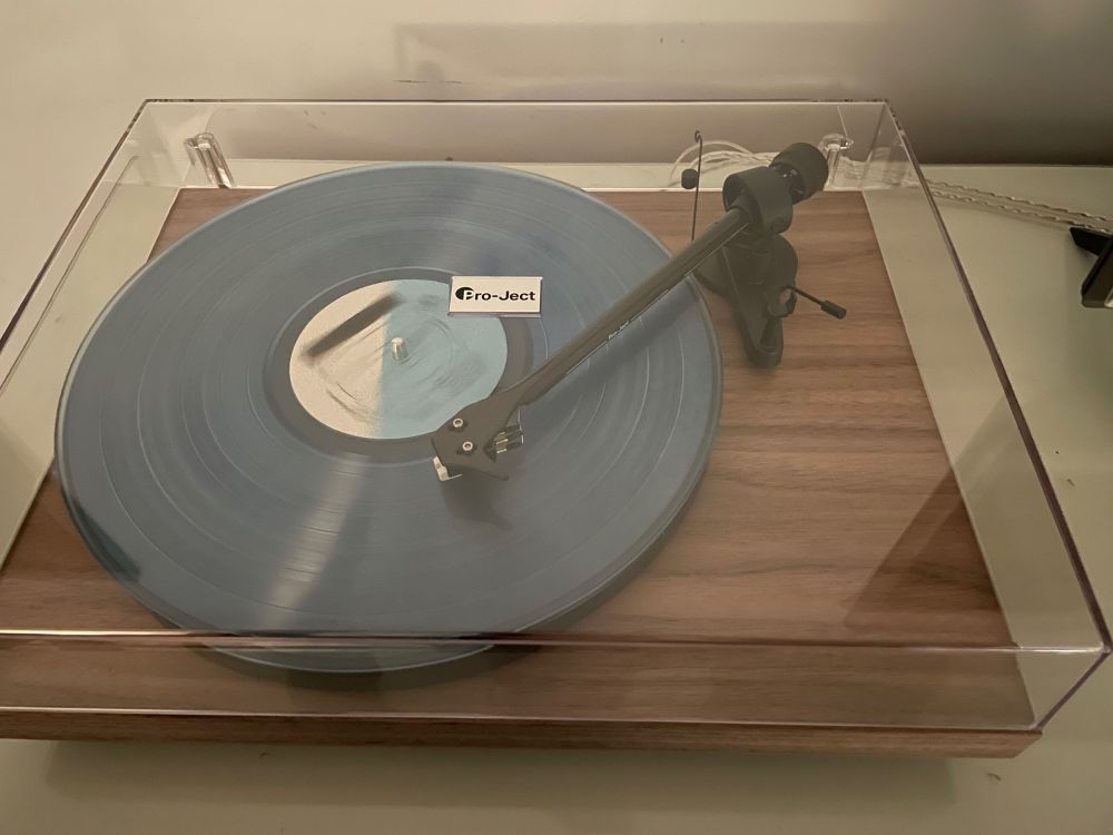 A photo of a spinning record player.