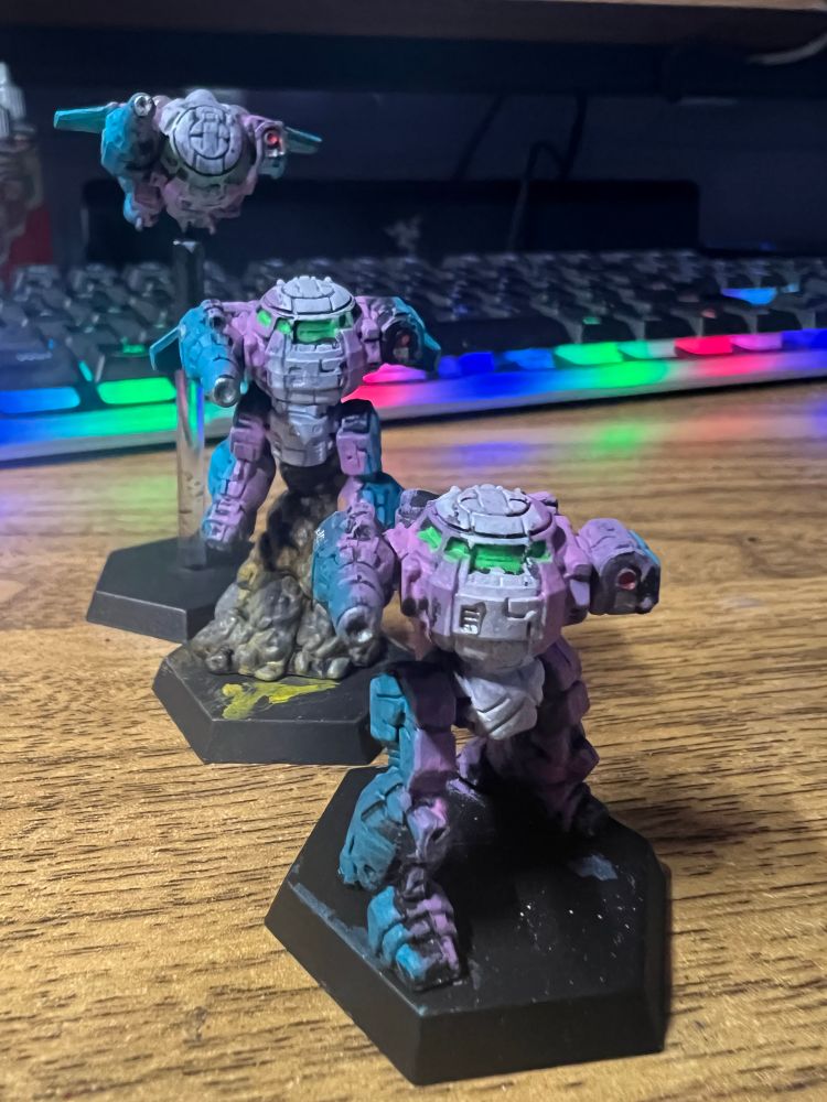 Urban mech painted in trans pride colors 
