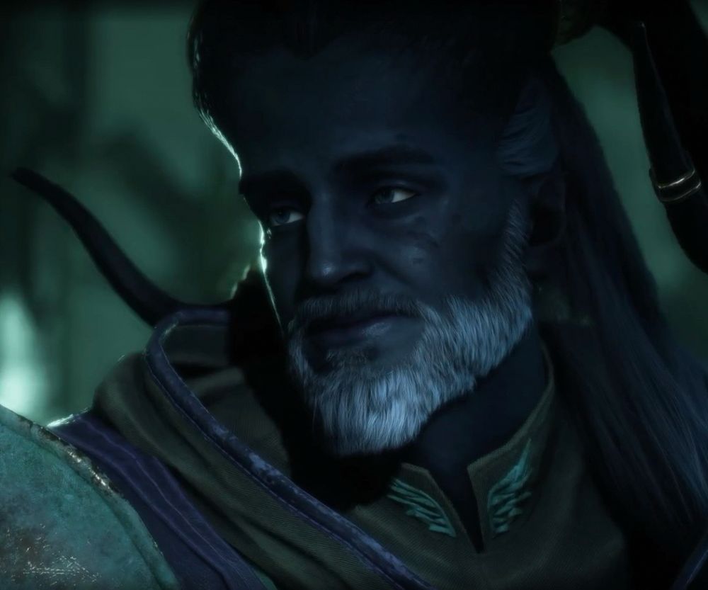 masc qunari Rook smiling at someone offscreen. he has dark gray skin, light gray/blue eyes, thick dark eyebrows, and a white beard and mustache, with a long white ponytail over his shoulder. his horns are black with gold ornamentation and curve forward on either side of his head. there are pock marks and scars on his cheek and forehead and he has a crooked nose and pointy chin. the entire image is lit by the eerie green color of the Grand Necropolis. he’s wearing purple and green Nevarran armor.