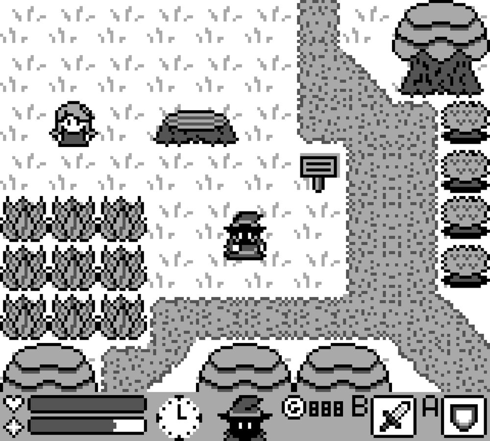 A mock-up screenshot of a top down Game Boy styled game.  A small wizard character stands in the middle of a forest scene, surrounded by trees, bushes and tall grass.