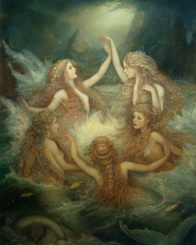Mermaids play in the water and talk to each other. About what? Only they know!