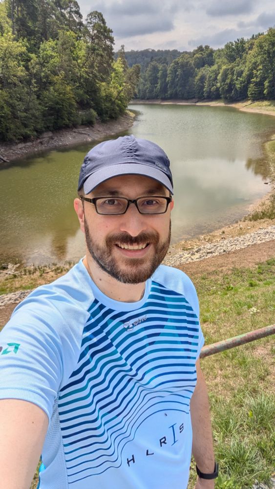 Runner's selfie with a lake in the background