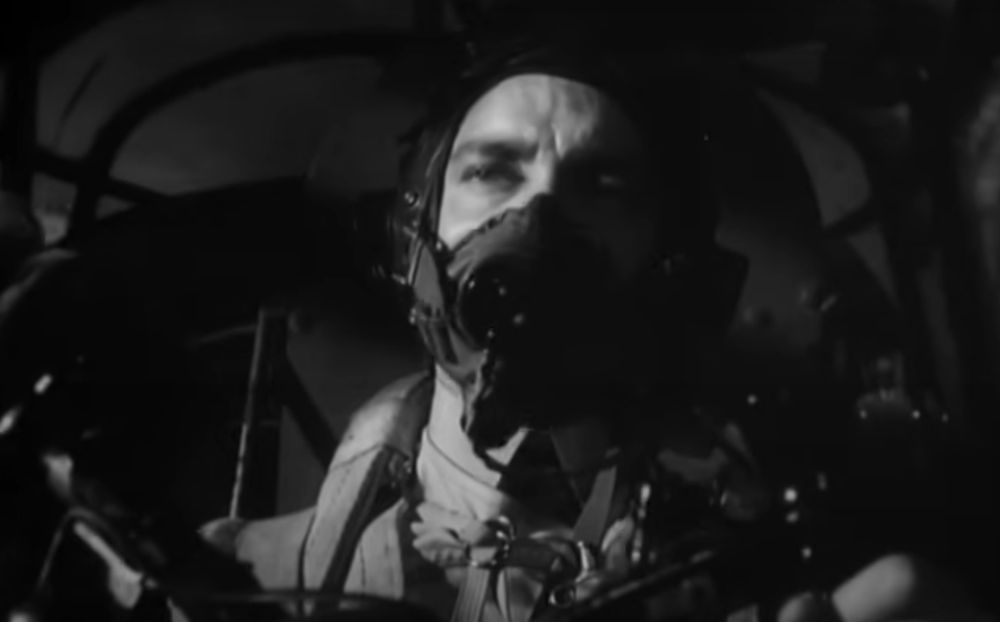 A still from 1955's 'The Dam Busters' showing a pilot in a cockpit during a bombing raid