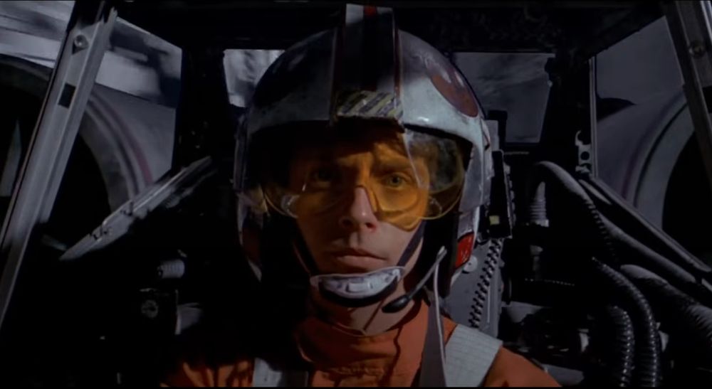 A screenshot of Luke Skywalker in his X-Wing cockpit during his bombing raid in Star Wars: A New Hope (1977)