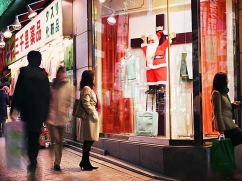 A crucified Santa in a store window in Japan.
