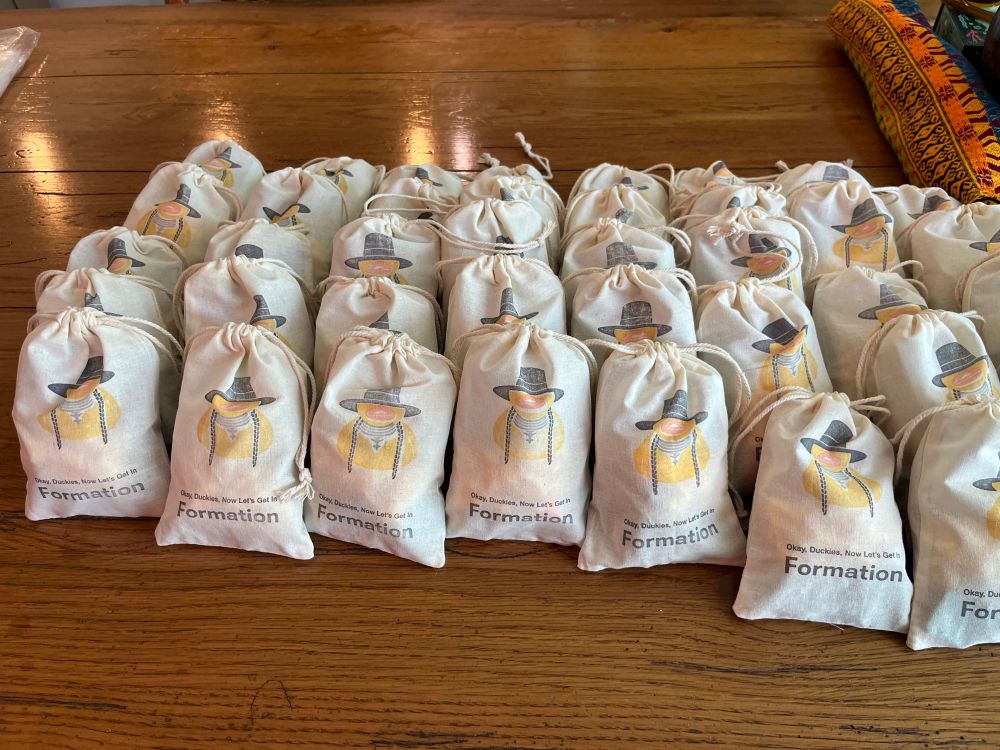 A number of packed ducky bags complete with all the game components.