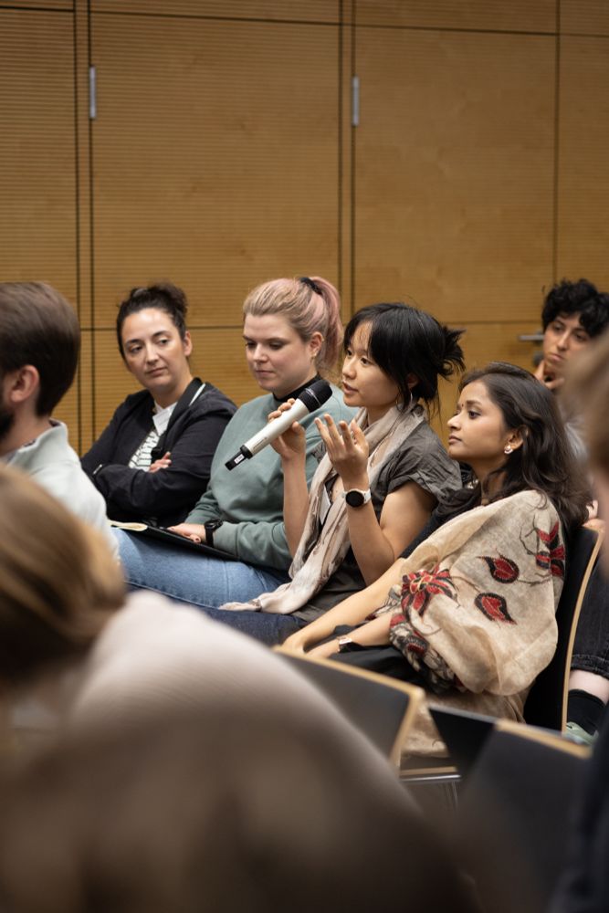 Audience member speaking at a panel session