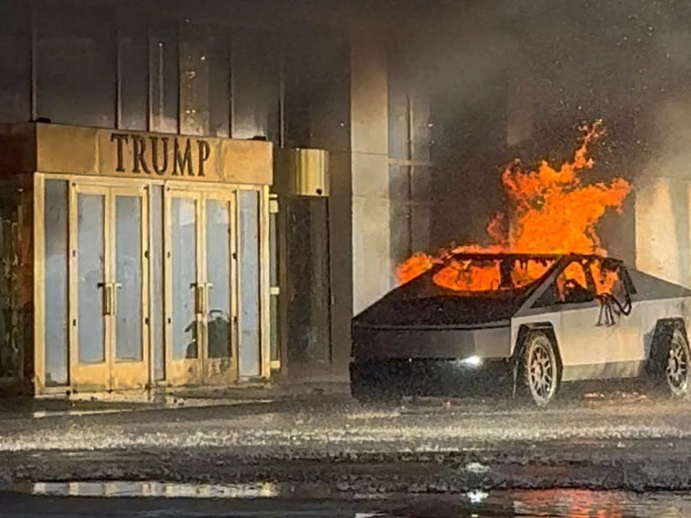 Burning Tesla by Trump Tower