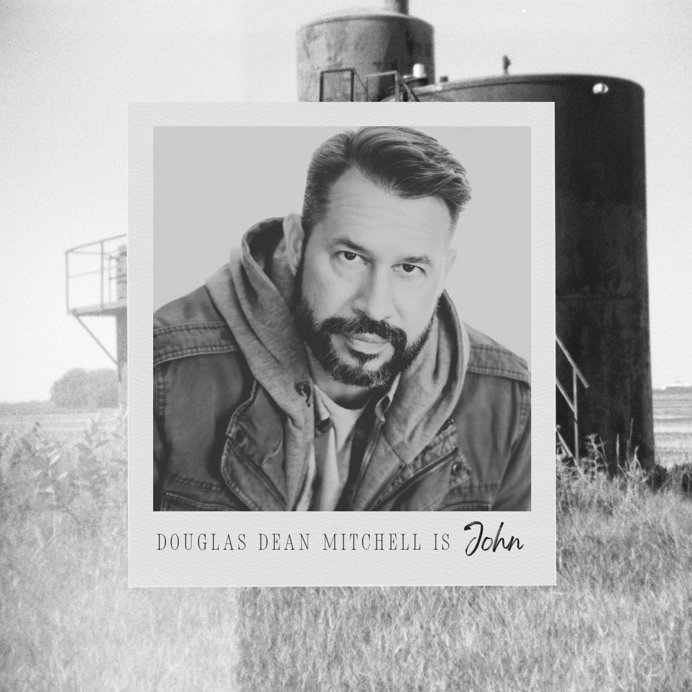 A black and white photo of Douglas Dean Mitchell. 