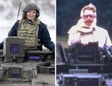 Margaret Thatcher (L) and Liz Truss (R) in a tank. Probably the same one, thanks to defence cuts