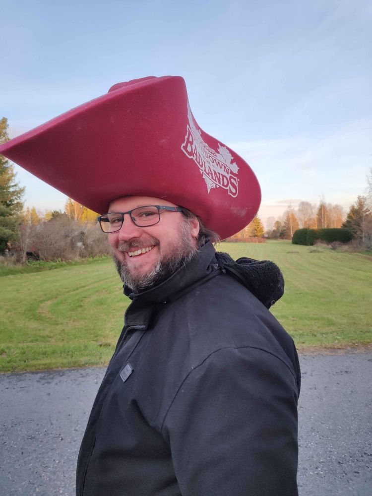 Old Guardian wearing a Hearthstone hat.