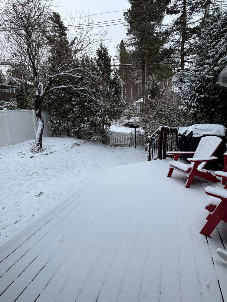 F*cking snow on deck and grass and chairs 