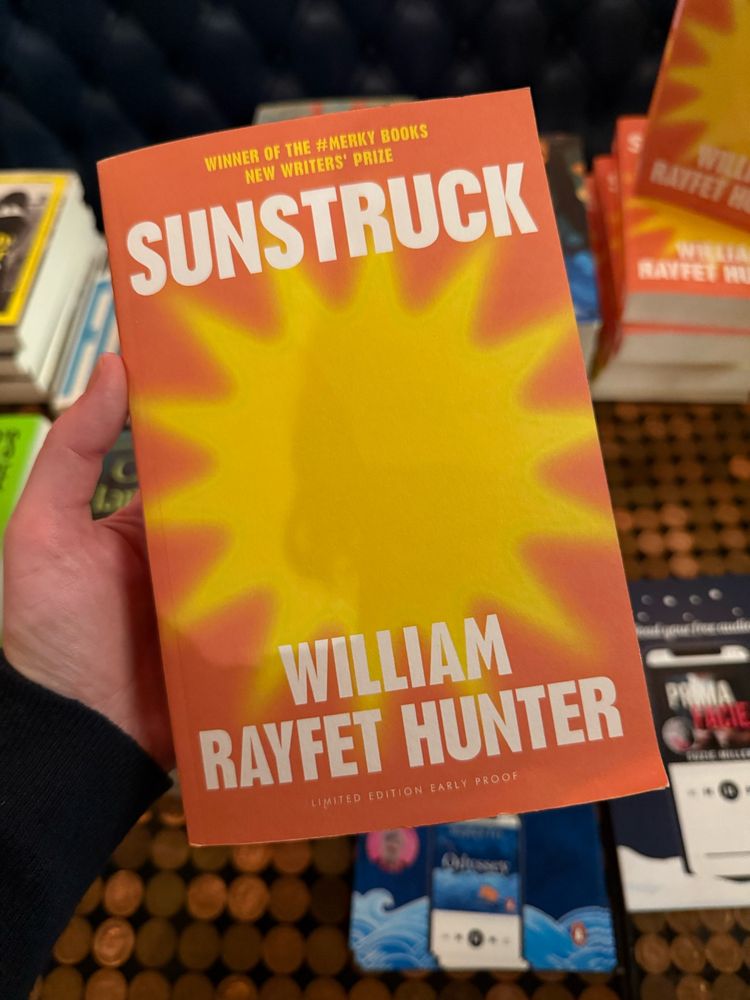 Bright orange book proof cover of Sunstruck by William Rayfet Hunter