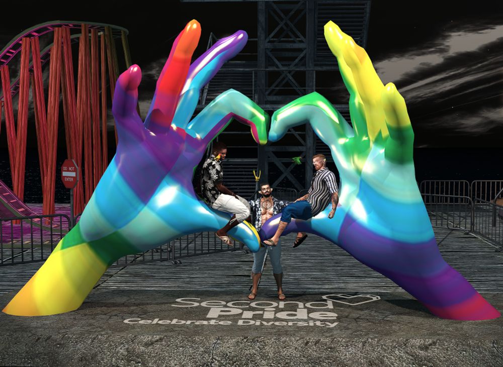 three male avatars seated in a sculpture of two hands side by side forming the heart hand symbol at the Second Pride region in Second Life