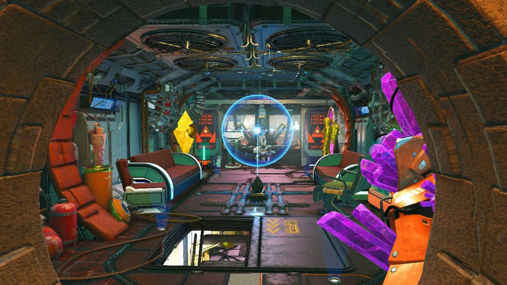 A living room above a ship's cockpit, adorned with a holographic display between two couches. The room is decorated with crystals, signs, and statues.