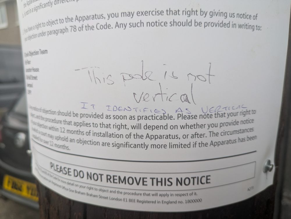 Standard notice informing of the right to object to the pole. Handwritten in black "this pole is not vertical", followed in another ink and hand "it identifies as vertical"