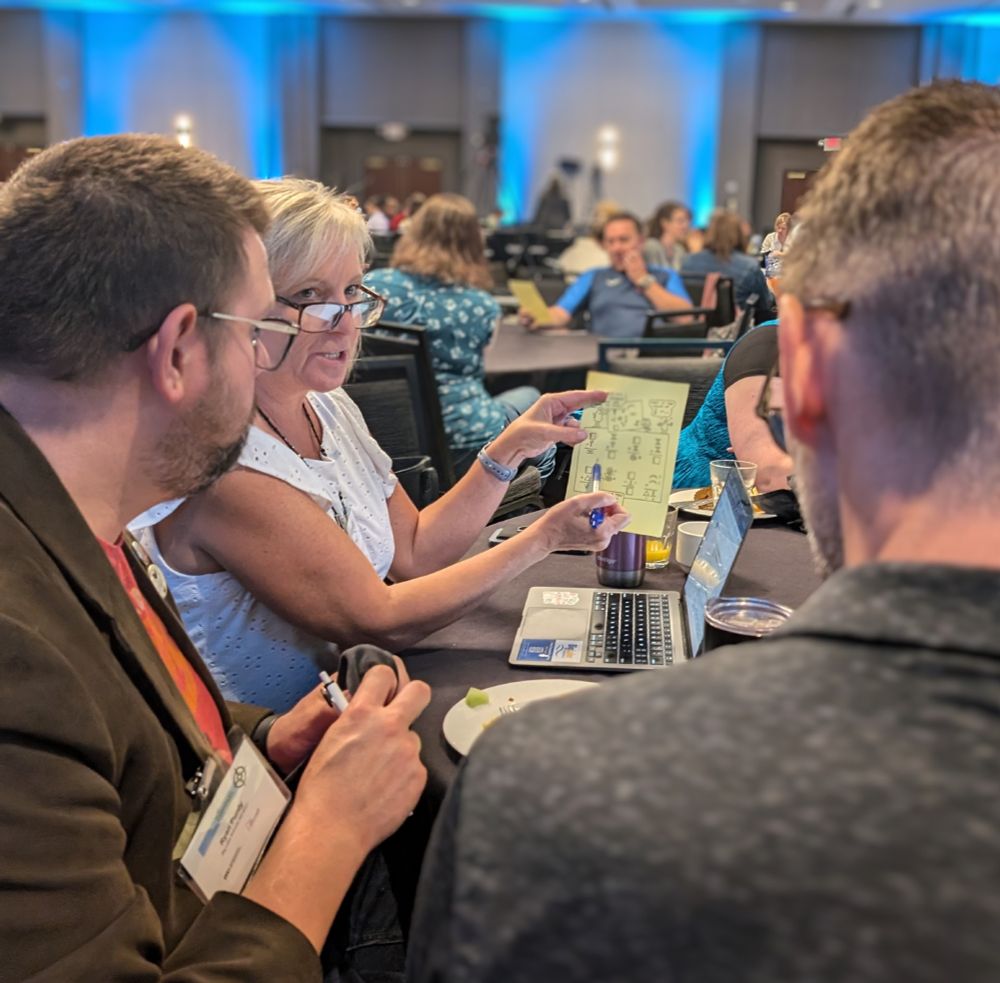Participants collaborate during a COMPASS session. 