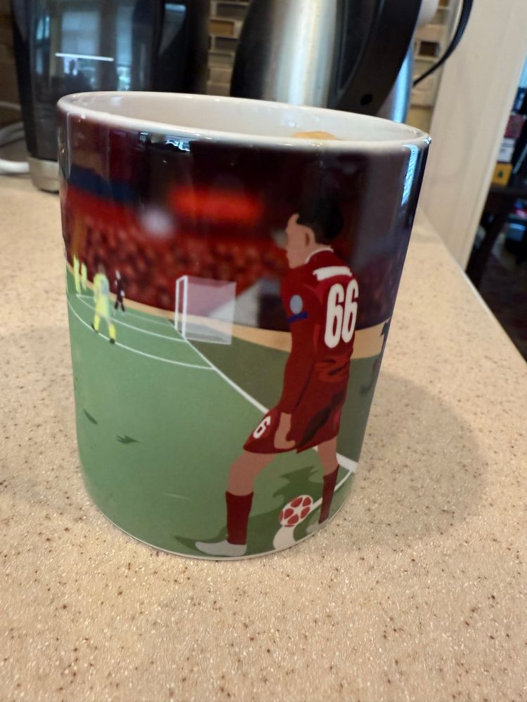 Coffee mug showing TAA’s famous corner taken quickly. 
