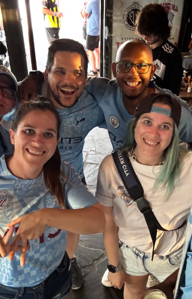 man city friends posing for a picture 