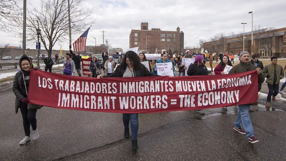 immigrant workers marching