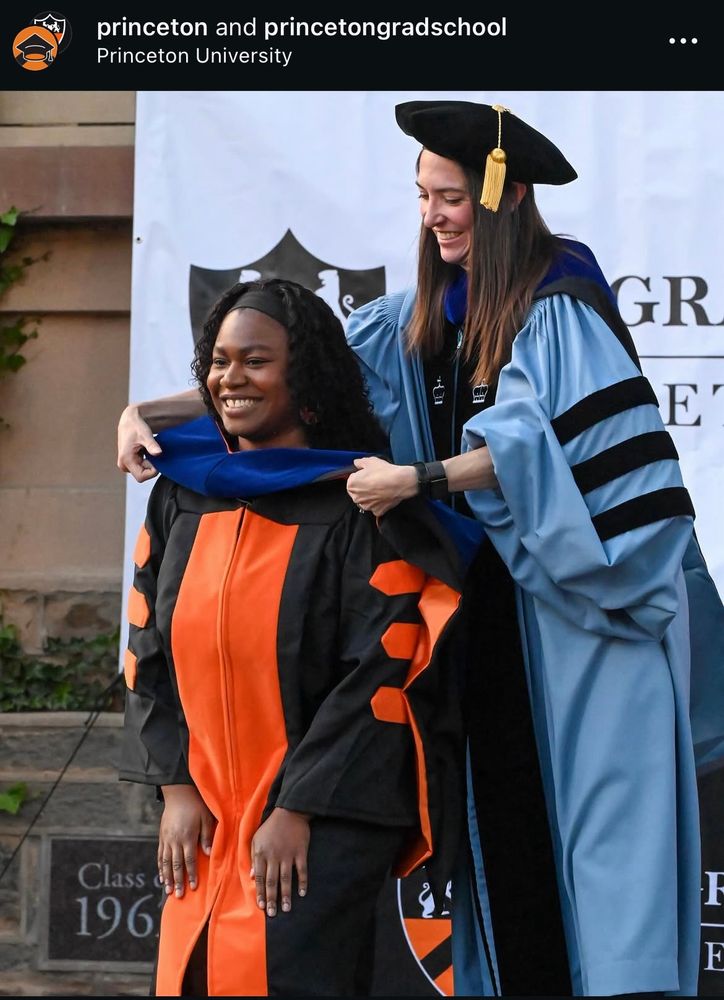 Cate Peña (in Columbia’s robes) hooding Rebekah Rashford in Princeton’s robes. Photo from the official university instagram account.