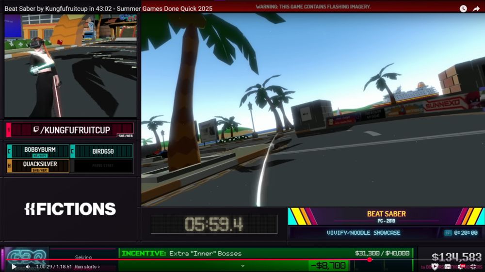 A screenshot of SGDQ 2025 with coconut mall beatsaber and sunnexo on a sign in the background for some reason 